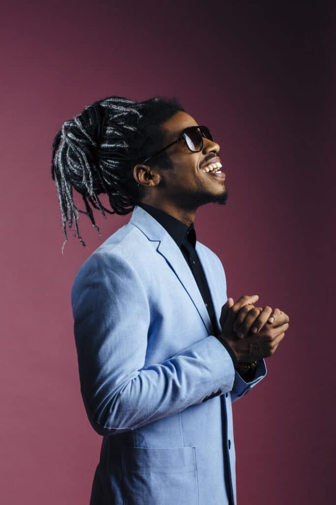 carlos david Blind man with dark sunglasses smiling